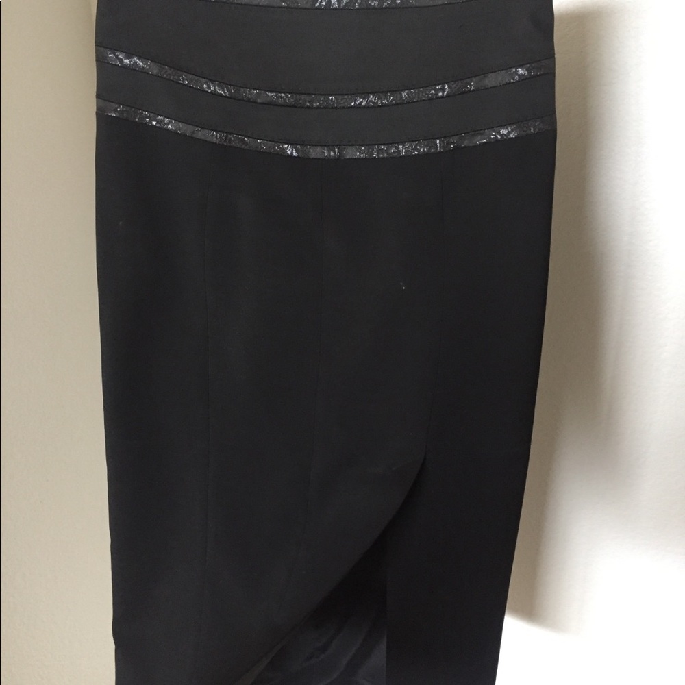 Pencil skirt just below knee, high waist & slit